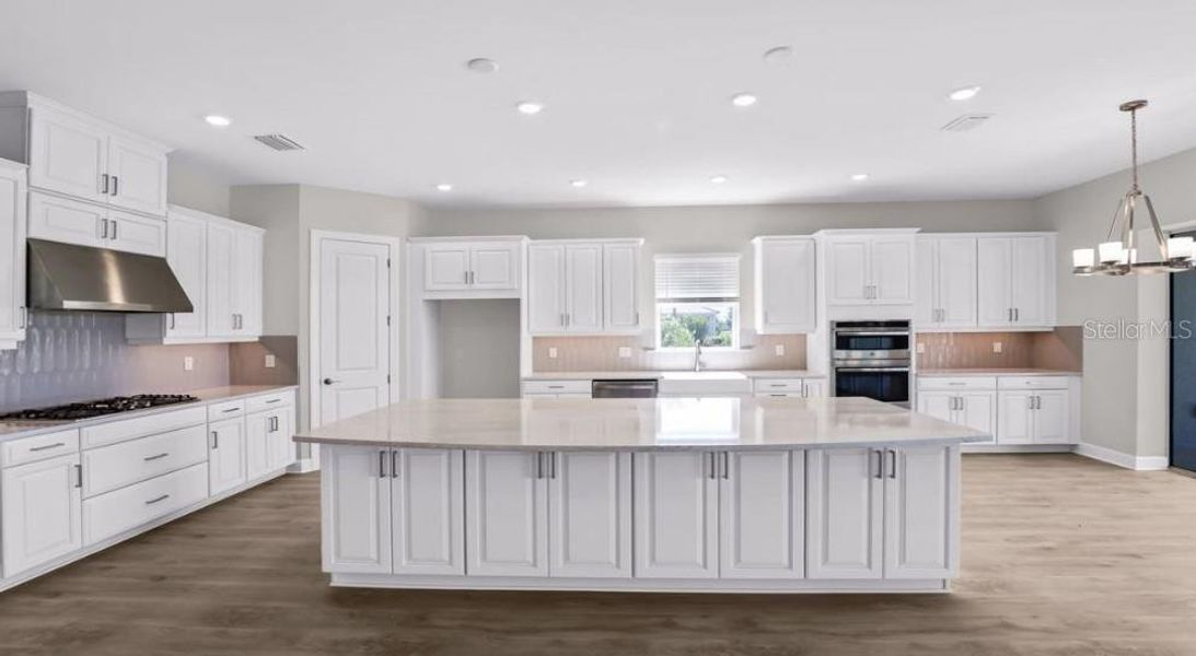 Furnished interior view inside a new home in Esplanade at Starling, Punta Gorda (Image 8). Furnished interior view inside a new home in Esplanade at Starling, Punta Gorda (Image 8).