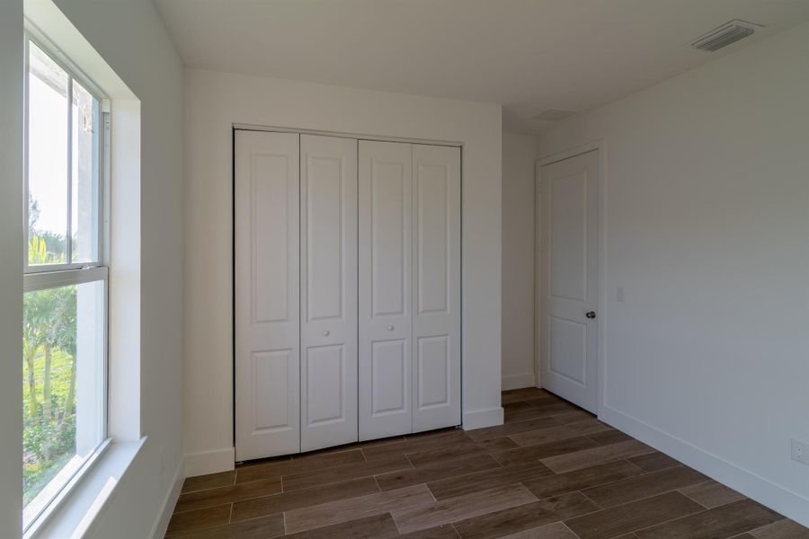 Spacious, unfurnished interior of a new home in , Port Charlotte (Image 11). Spacious, unfurnished interior of a new home in , Port Charlotte (Image 11).