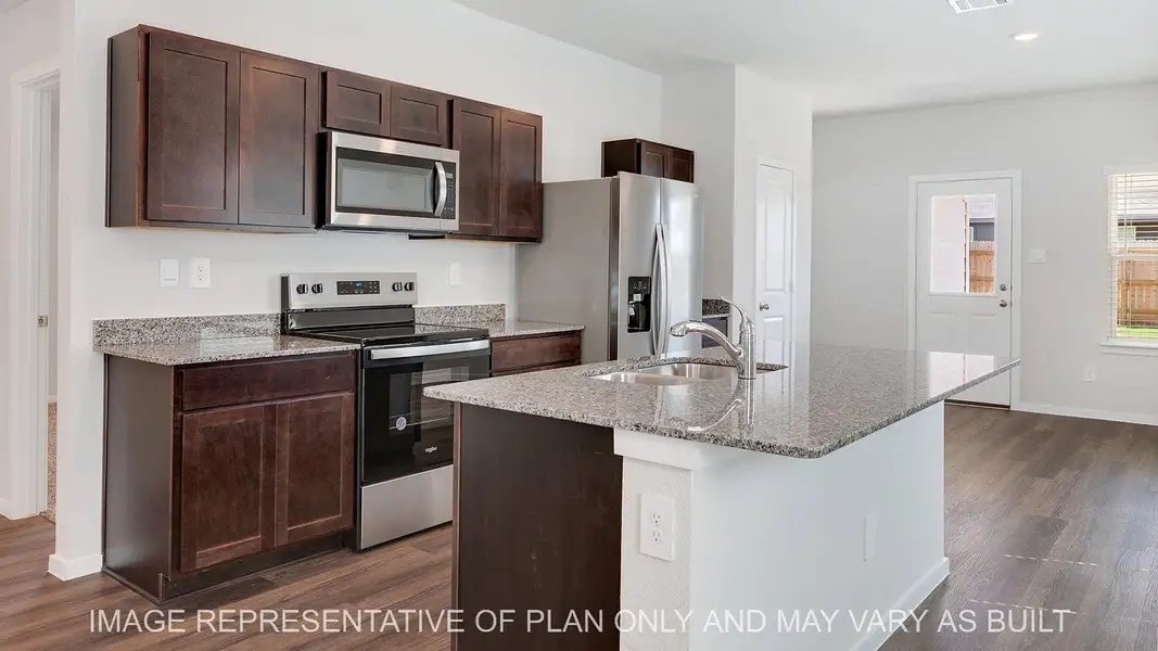 Furnished interior view inside a new home in Midtown Reserve, College Station (Image 4). Furnished interior view inside a new home in Midtown Reserve, College Station (Image 4).
