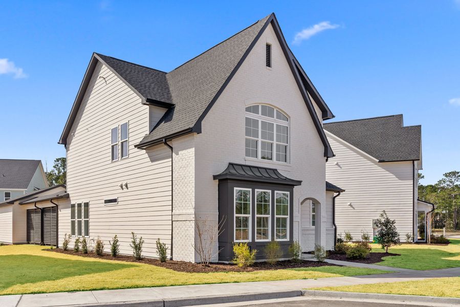 Representative exterior photo of a completed home built from the The Lennon by RobuckHomes in East & Mason, Wilmington, NC (Image 13).