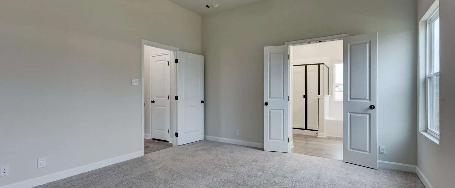 Representative unfurnished interior of a home built from the Sycamore by Ashton Woods in Arcadia Ridge, San Antonio (Image 17).