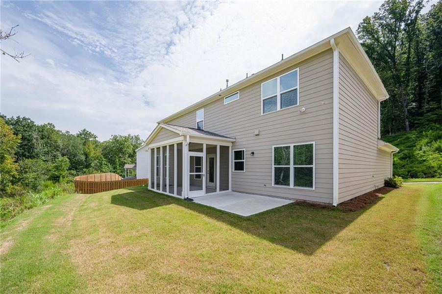 Front exterior of a new home in Sierra Creek, Hoschton, GA, highlighting curb appeal (Image 19). Front exterior of a new home in Sierra Creek, Hoschton, GA, highlighting curb appeal (Image 19).