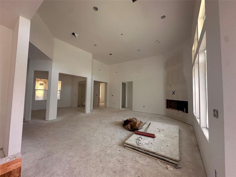 Living space showing (temporary) double entry door and dining room