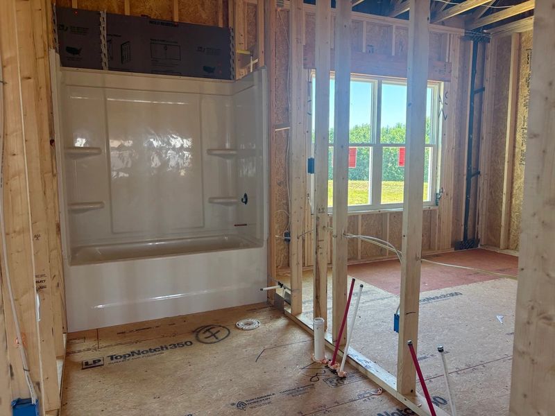 In-progress construction of a new home in The Point, Rolesville, NC (Image 10).