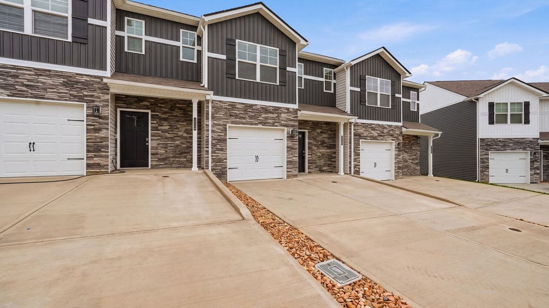 Front exterior of a new home in The Arbor Townhomes, Kingsport, TN, highlighting curb appeal (Image 2).