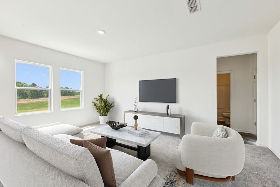 Representative furnished interior of a home built from the Galileo by Starlight Homes in Harrington Trails at The Canopies, New Caney (Image 19).