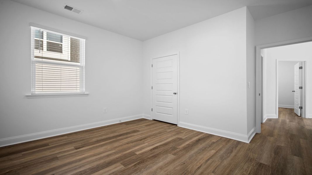 Spacious, unfurnished interior of a new home in The Lakes at North Glynn, Brunswick (Image 24).