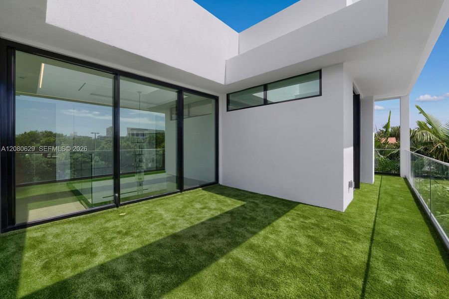 Exterior details and patio area of a home in , Miami Beach (Image 3).