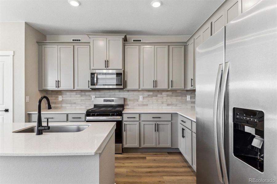 Furnished interior view inside a new home in Second Creek Farm, Commerce City (Image 5).