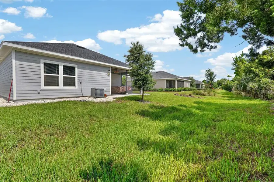 Exterior details and patio area of a home in , Ormond Beach (Image 24).