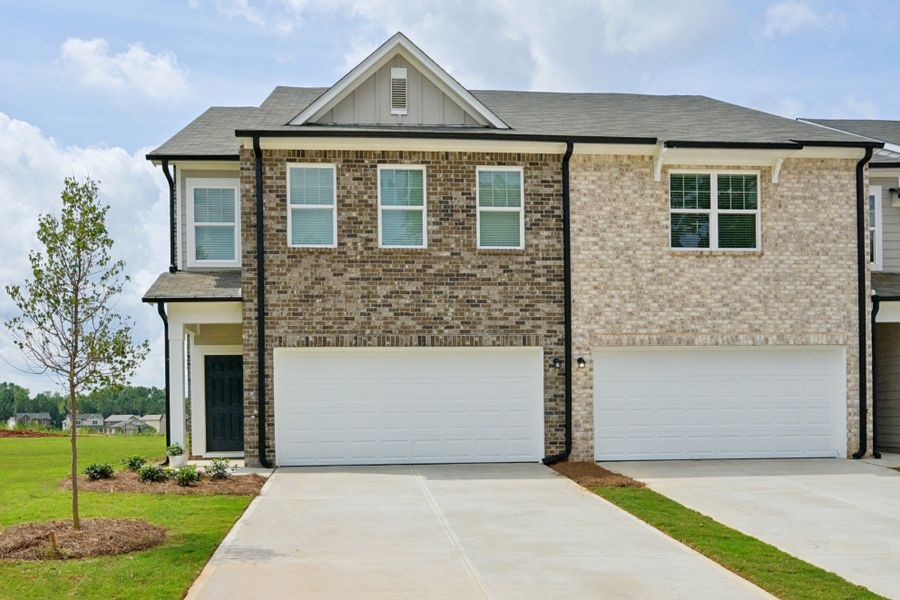 Representative exterior photo of a completed home built from the Triton by Starlight Homes in Kendall Grove, McDonough, GA (Image 2). Representative exterior photo of a completed home built from the Triton by Starlight Homes in Kendall Grove, McDonough, GA (Image 2).