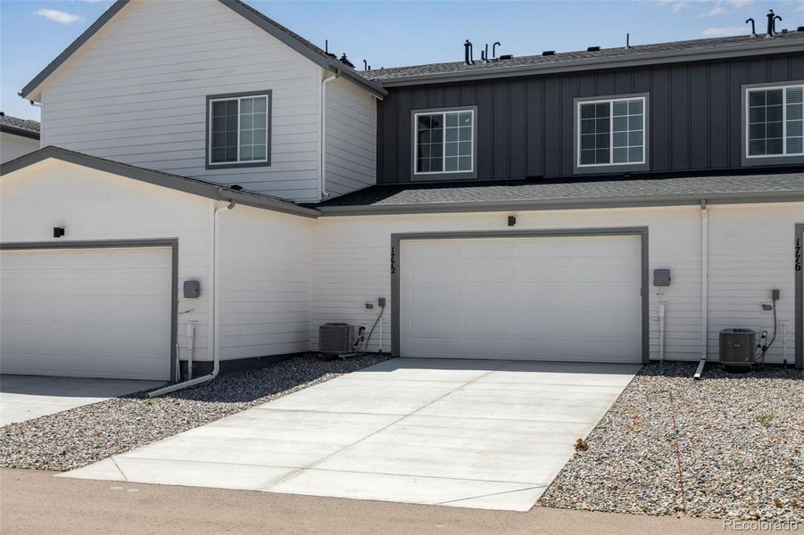 Front exterior of a new home in , Berthoud, CO, highlighting curb appeal (Image 21).