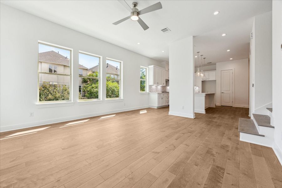 Different View of the Living Area * Opens to the Kitchen * Gallery Wall is In Between and Perfect for Your Art. Different View of the Living Area * Opens to the Kitchen * Gallery Wall is In Between and Perfect for Your Art.