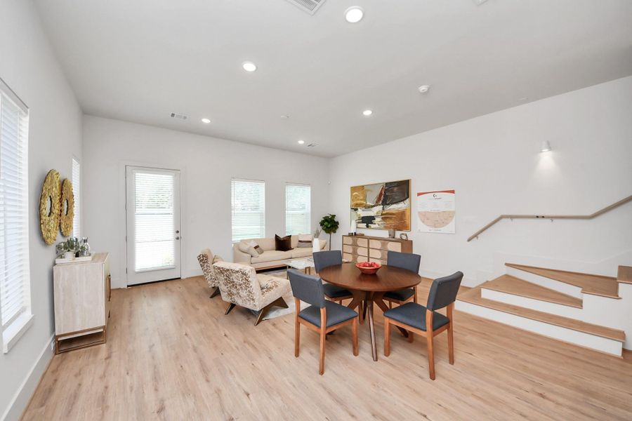 This point of view where you can appreciate the entrance and the open concept; the dining room sets the tone for the rest of the home, promising warmth, comfort, and a sense of arrival. This point of view where you can appreciate the entrance and the open concept; the dining room sets the tone for the rest of the home, promising warmth, comfort, and a sense of arrival.