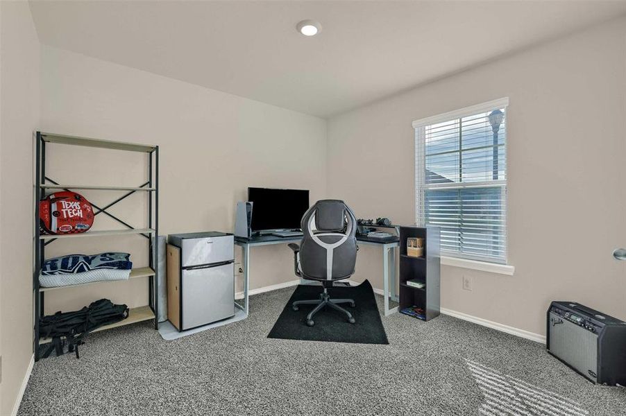 Office area featuring carpet