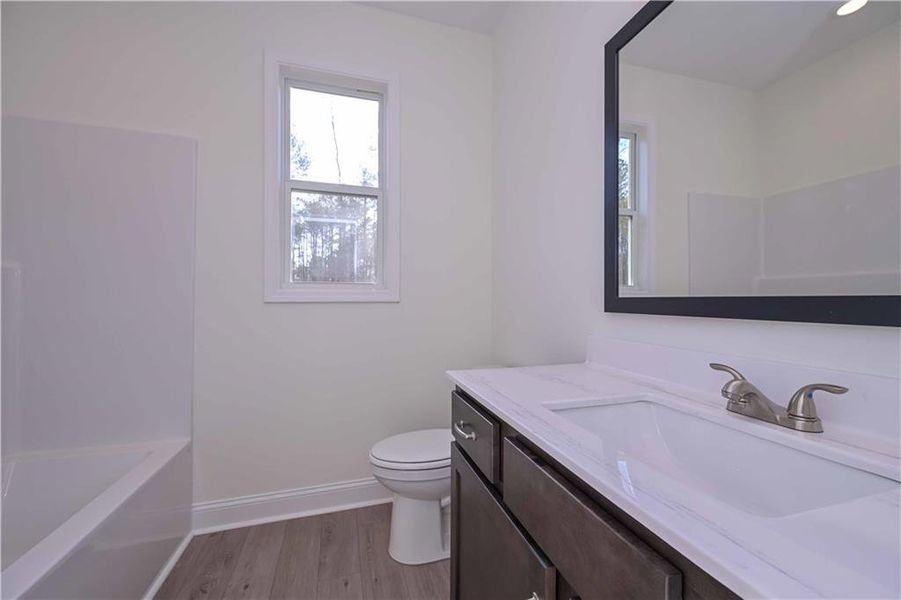 Furnished interior view inside a new home in , Buchanan (Image 12).
