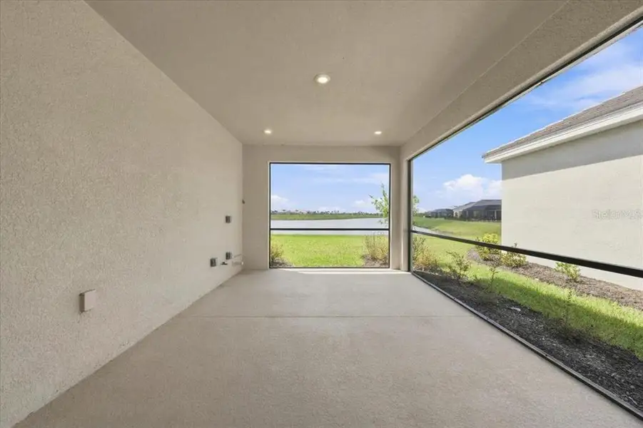 Exterior details and patio area of a home in Coasterra Community Group Page, Palmetto (Image 3).