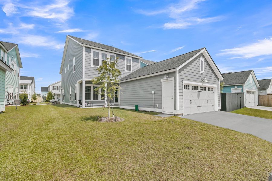 Front exterior of a new home in Carnes Crossroads, Summerville, SC, highlighting curb appeal (Image 1). Front exterior of a new home in Carnes Crossroads, Summerville, SC, highlighting curb appeal (Image 1).