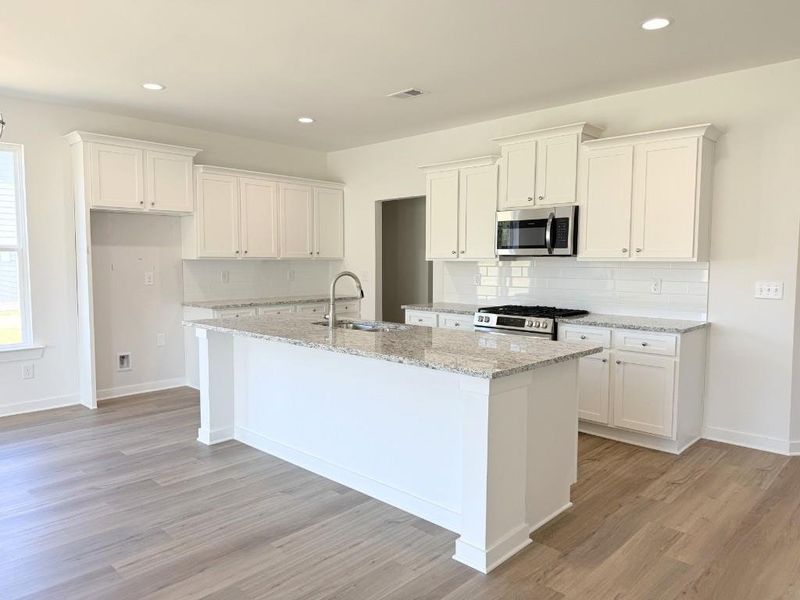 Furnished interior view inside a new home in Sutton's Landing, Statham (Image 8).