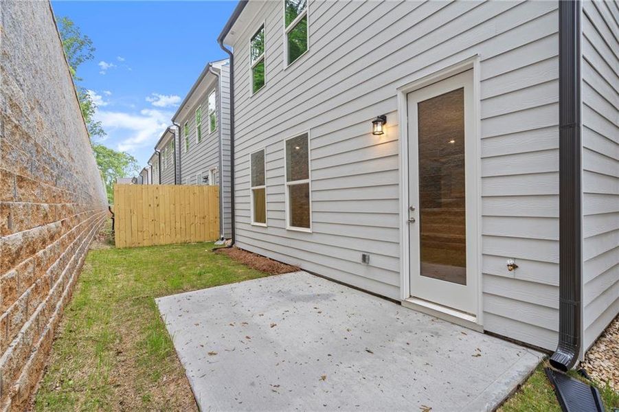 Exterior details and patio area of a home in The Village at Shallowford, Kennesaw (Image 21).