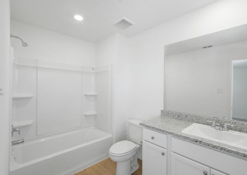 Bathroom with a shower/tub combination