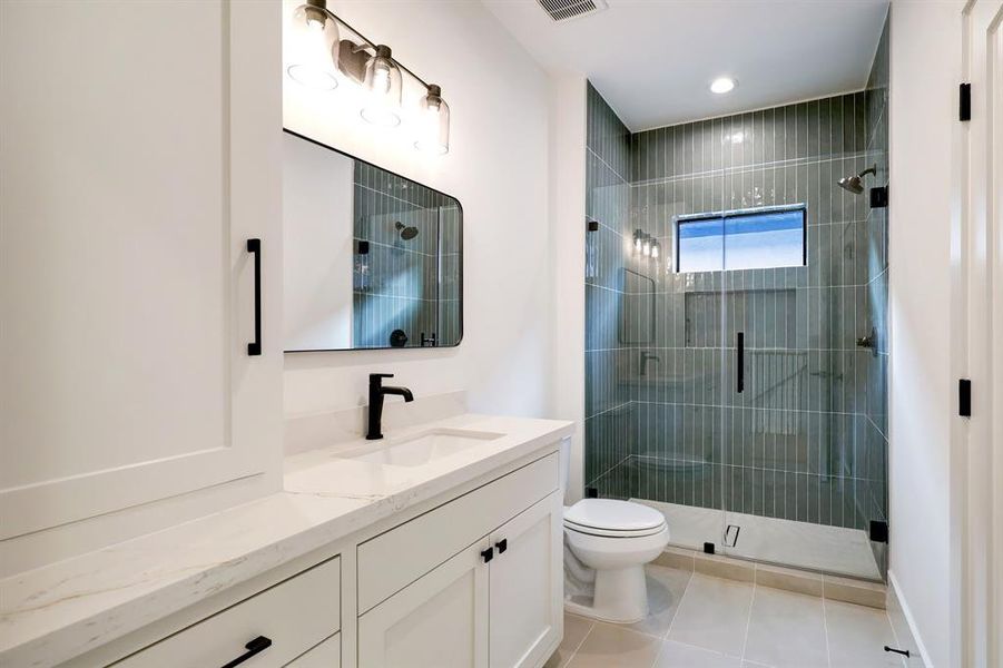 Third-level bathroom, showcasing a sleek design