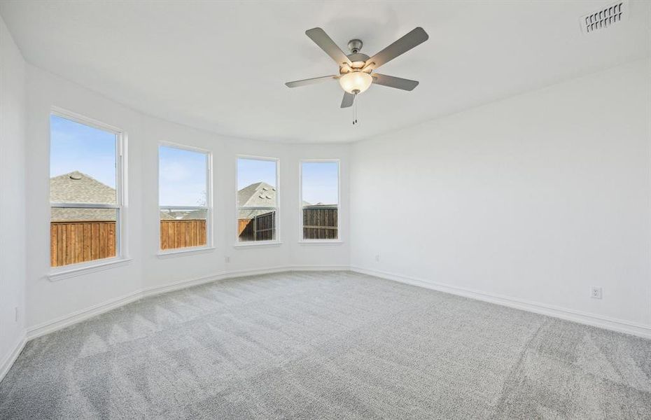 Elegant owner's suite with Bay window *real home pictured