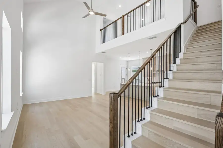 Spacious, unfurnished interior of a new home in Saddle Ridge at Wildhorse Ranch, Manor (Image 12).