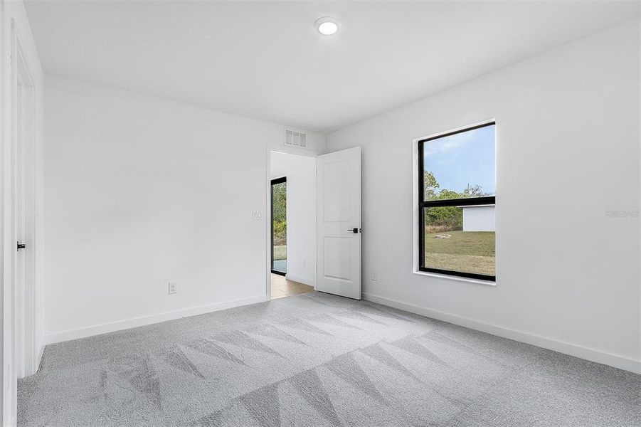 Spacious, unfurnished interior of a new home in , North Port (Image 17). Spacious, unfurnished interior of a new home in , North Port (Image 17).