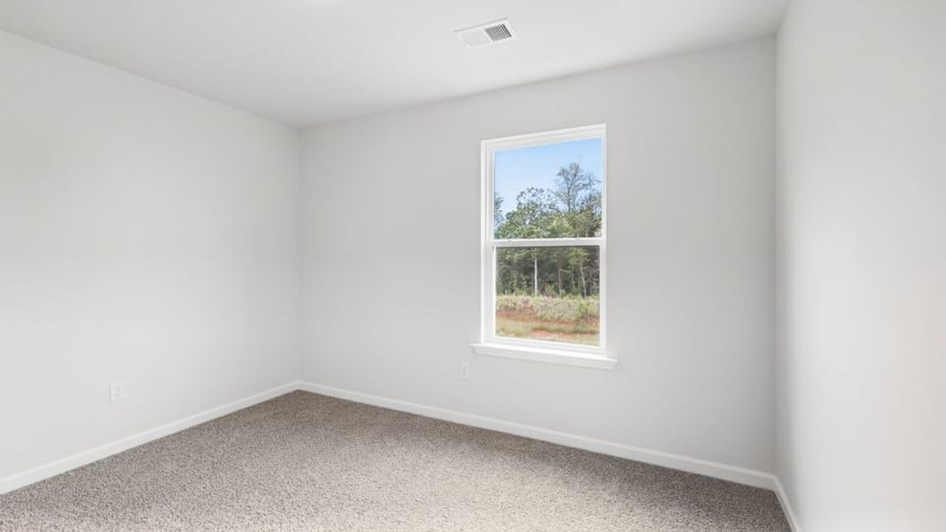 Spacious, unfurnished interior of a new home in Durbin Meadows Traditions, Fountain Inn (Image 29).