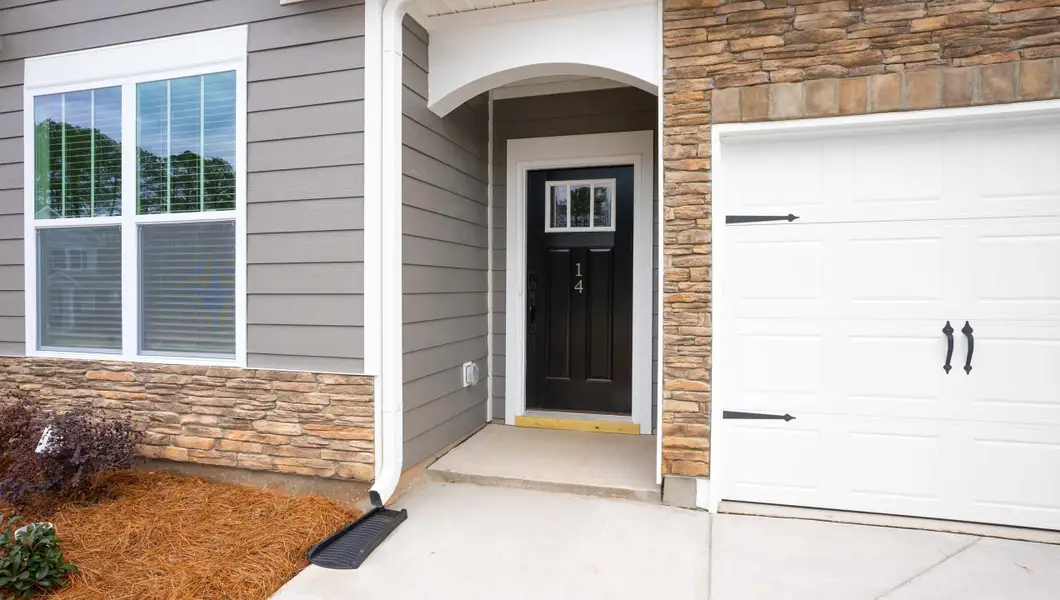 Exterior details and patio area of a home in Arrowood Acres, Enoree (Image 2). Exterior details and patio area of a home in Arrowood Acres, Enoree (Image 2).