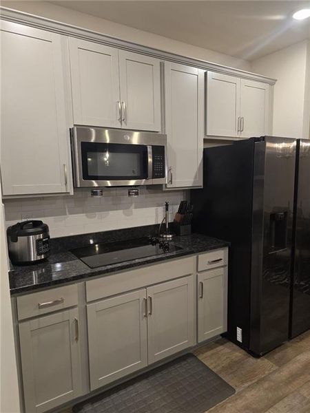 Furnished interior view inside a new home in Fern Dale, Fairburn (Image 19).