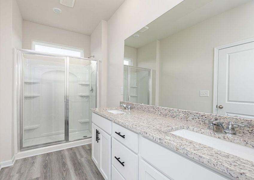 Get ready for your day in the master bathroom