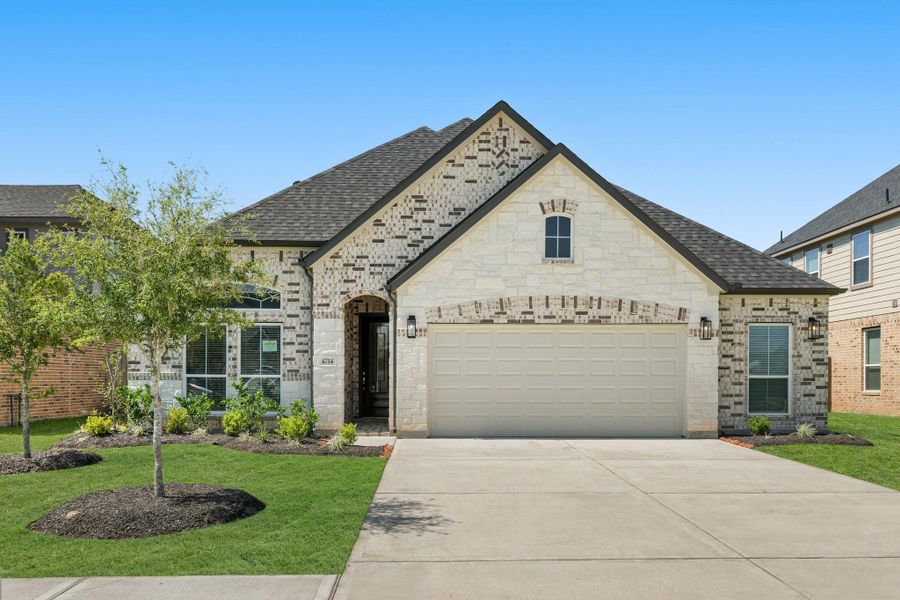 Front exterior of a new home in Briarwood Crossing, Rosenberg, TX, highlighting curb appeal (Image 20). Front exterior of a new home in Briarwood Crossing, Rosenberg, TX, highlighting curb appeal (Image 20).