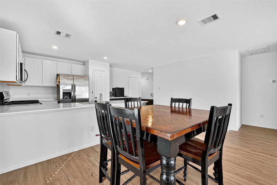 Furnished interior view inside a new home in Sunterra: Watermill Collection, Katy (Image 3).