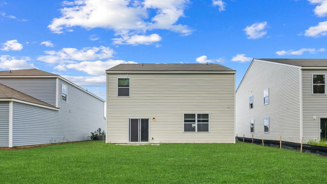 Front exterior of a new home in Rice Hope, Port Wentworth, GA, highlighting curb appeal (Image 2).