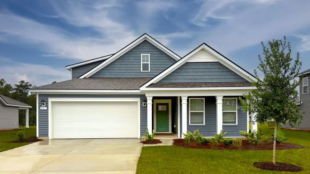 Front exterior of a new home in Evington Place, Longs, SC, highlighting curb appeal (Image 2).
