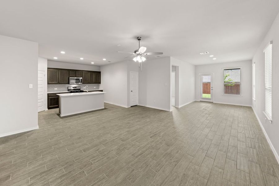 Representative exterior photo of a completed home built from the Hickory by Impression Homes in Northspur, Terrell, TX (Image 6). Representative exterior photo of a completed home built from the Hickory by Impression Homes in Northspur, Terrell, TX (Image 6).