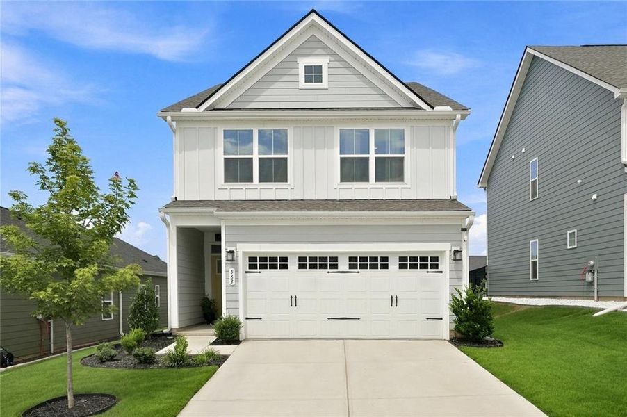 Front exterior of a new home in , Hoschton, GA, highlighting curb appeal (Image 2). Front exterior of a new home in , Hoschton, GA, highlighting curb appeal (Image 2).