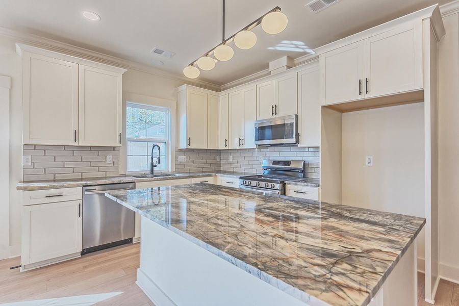 Furnished interior view inside a new home in , North Charleston (Image 5).