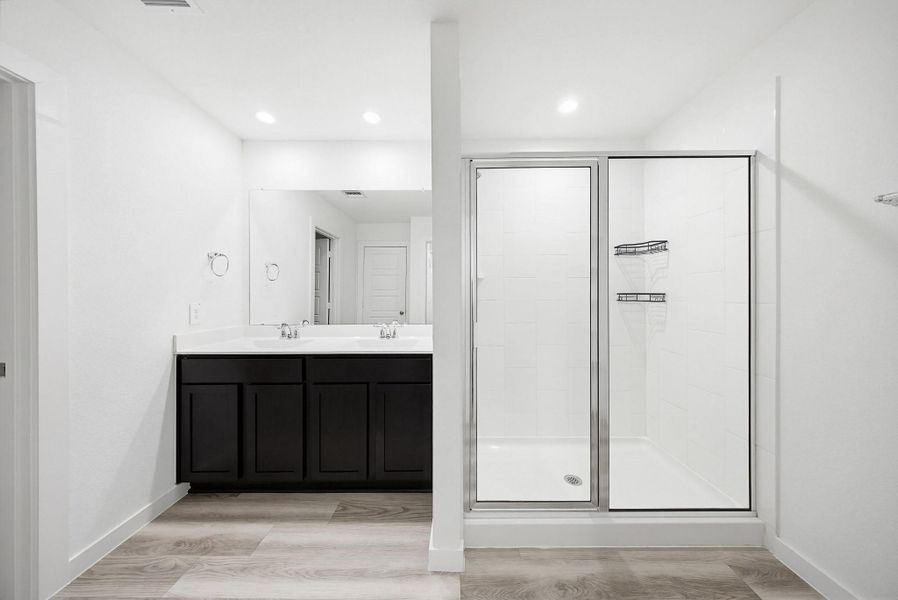 Primary bathrooms walk in shower