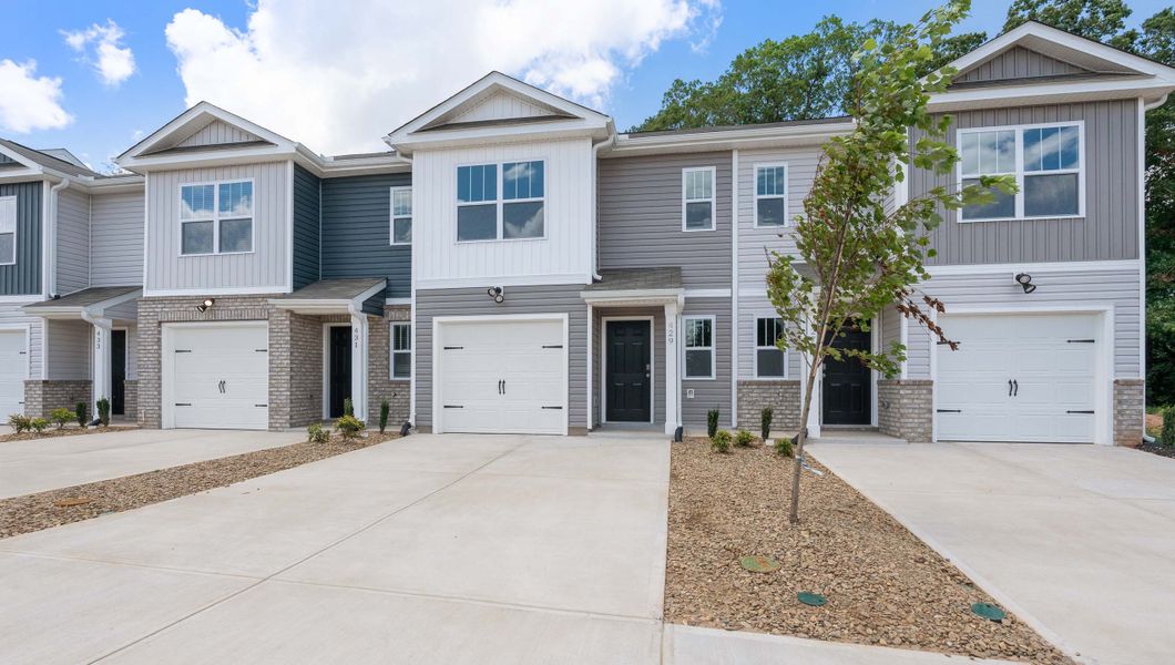 Front exterior of a new home in Covington Village, Greer, SC, highlighting curb appeal (Image 2).