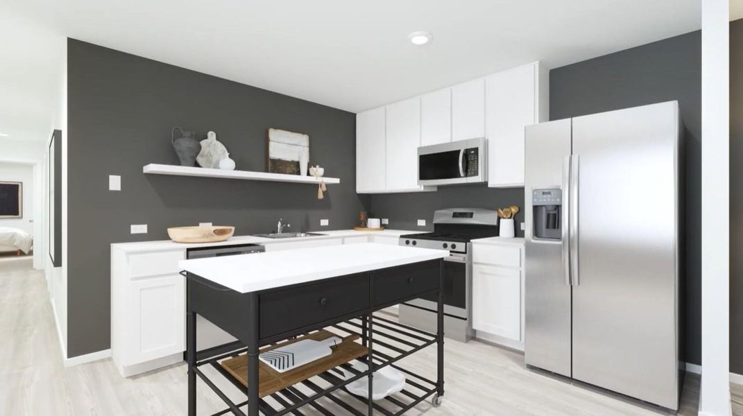 **Photos are a representation of the floor plan. This is not the actual homesite.**