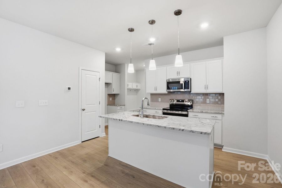 Furnished interior view inside a new home in Sloan Station, Charlotte (Image 18).