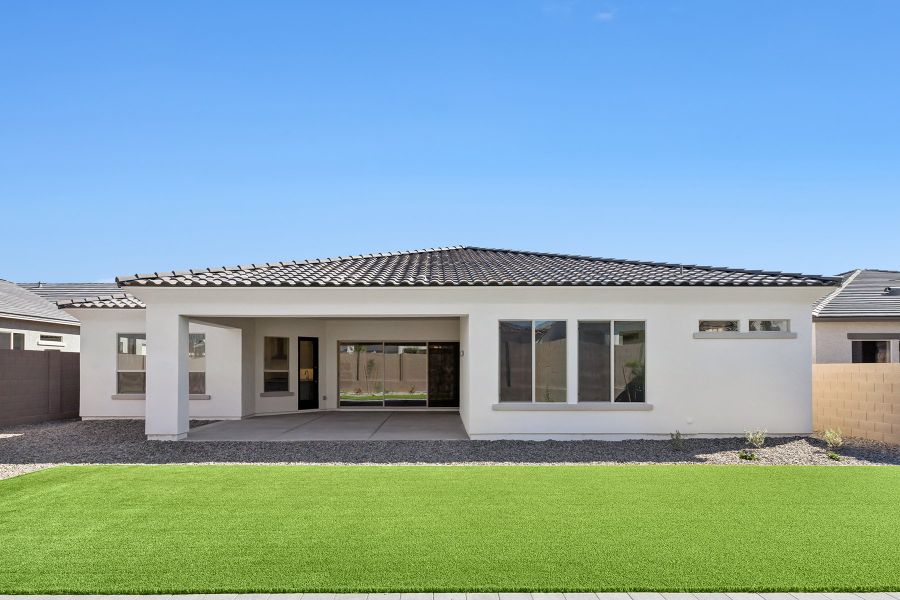 Exterior details and patio area of a home in Sentiero at Windrose, Waddell (Image 3).