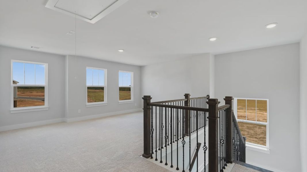 Representative furnished interior of a home built from the Stonefield - Finished Basement by DRB Homes in Pinebrook, Woodruff (Image 26).