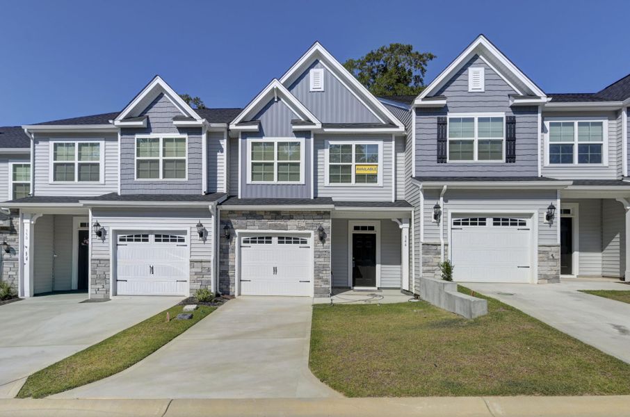 Front exterior of a new home in Kensington Place Townhomes, Lexington, SC, highlighting curb appeal (Image 2).