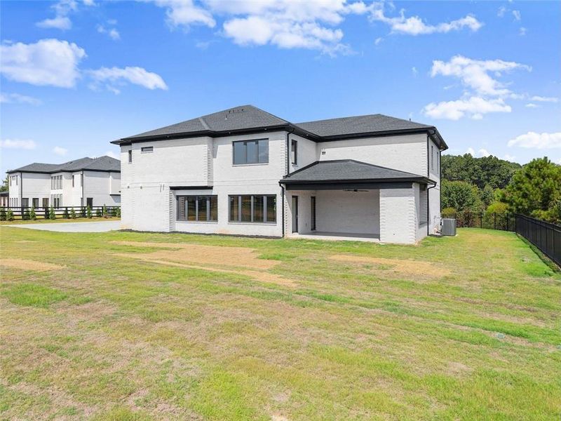 Front exterior of a new home in , Dacula, GA, highlighting curb appeal (Image 2).