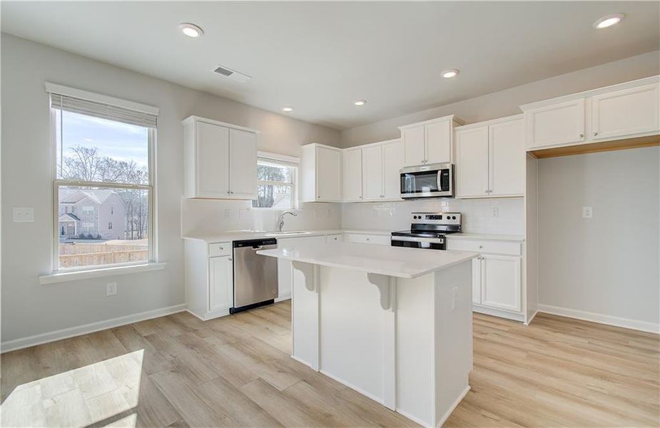 Furnished interior view inside a new home in Cedar Grove Commons, Conley (Image 6). Furnished interior view inside a new home in Cedar Grove Commons, Conley (Image 6).
