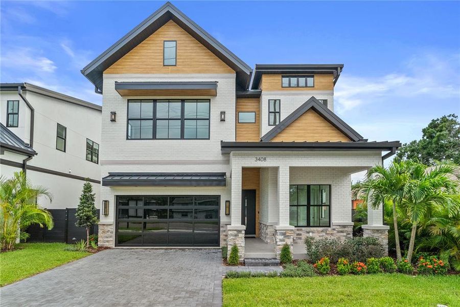 Front exterior of a new home in , Tampa, FL, highlighting curb appeal (Image 2). Front exterior of a new home in , Tampa, FL, highlighting curb appeal (Image 2).